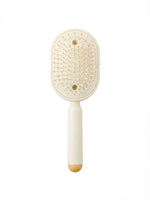 Brosse à cheveux crème, côté picots