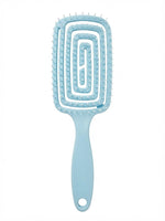 Brosse démêlante flexible bleu ciel, côté picots