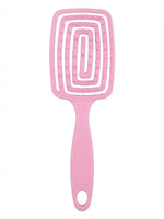 Brosse démêlante flexible rose, dos ajouré
